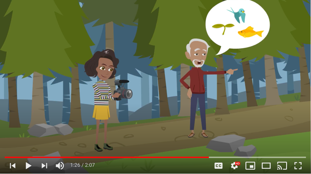 A video still from an animated video in which a woman is audio and video recording a man in a forest setting. There is a speech bubble near the man that contains images of a plant, a bird, and a fish.